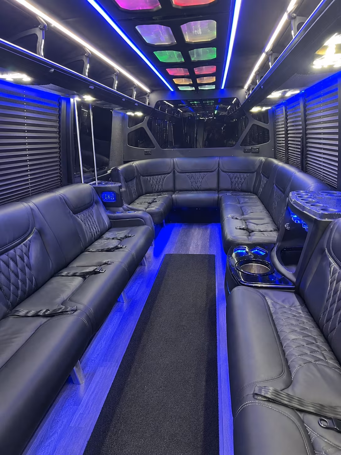 Wedding guests seated inside a party bus serving Boise